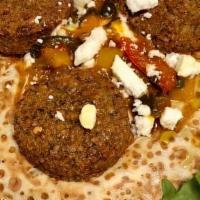 Hummus & Falafel Crepe · Feta cheese, Olives, Arugula, Moroccan Salsa, Cucumber tzatziki.