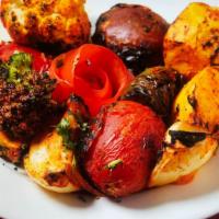 Tandoor Vegetables · An assortment of fresh vegetables marinated and barbequed in a clay oven paneer, pineapple, ...