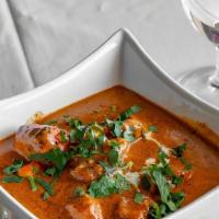 Chicken Tikka Masala · Has nuts. Marinated boneless pieces of chicken grilled and sauteed in a delicious creamy tom...
