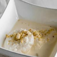Rasmalai · Vegetarian, gluten free. The most famous dessert of homemade cheese is served with reduced m...