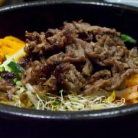 Bulgogi Hotpot Bibimbap 불고기 돌솥 · Marinated beef bulgogi, vegetables & rice in sizzling hotpot.