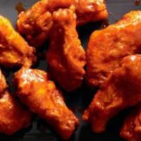 Buffalo Wings (12) · Served with celery and your choice of sauce.