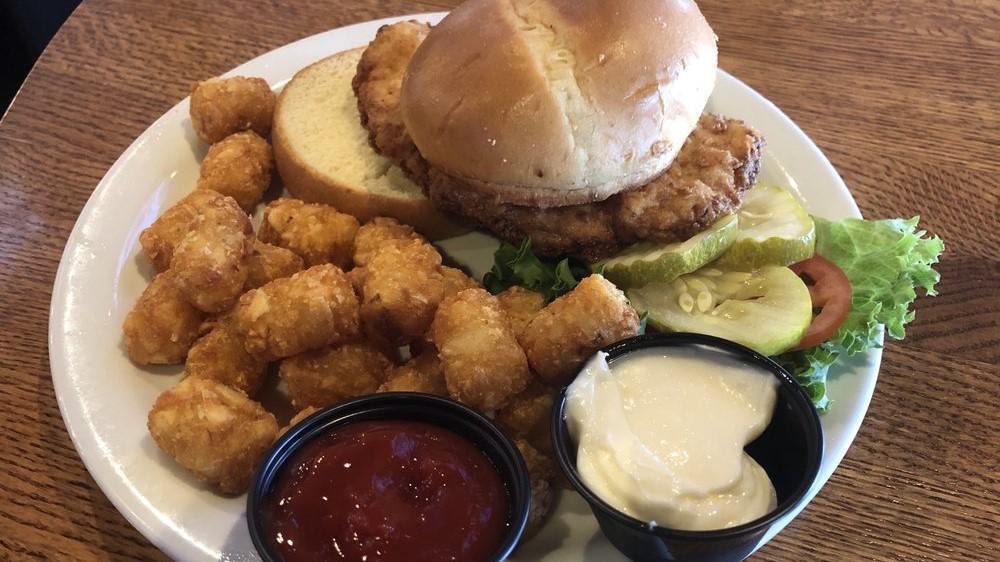 Pork Tenderloin · A giant hand cut tenderloin grilled or freshly breaded. Served with lettuce, tomato, pickle and a side of mayo.