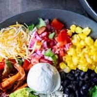Bowl · Lettuce, rice, beans, pico de gallo, sour cream, carrots.