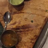 Masala Dosa · Rice crepes stuffed with spicy potatoes, served with sambar and chutney.