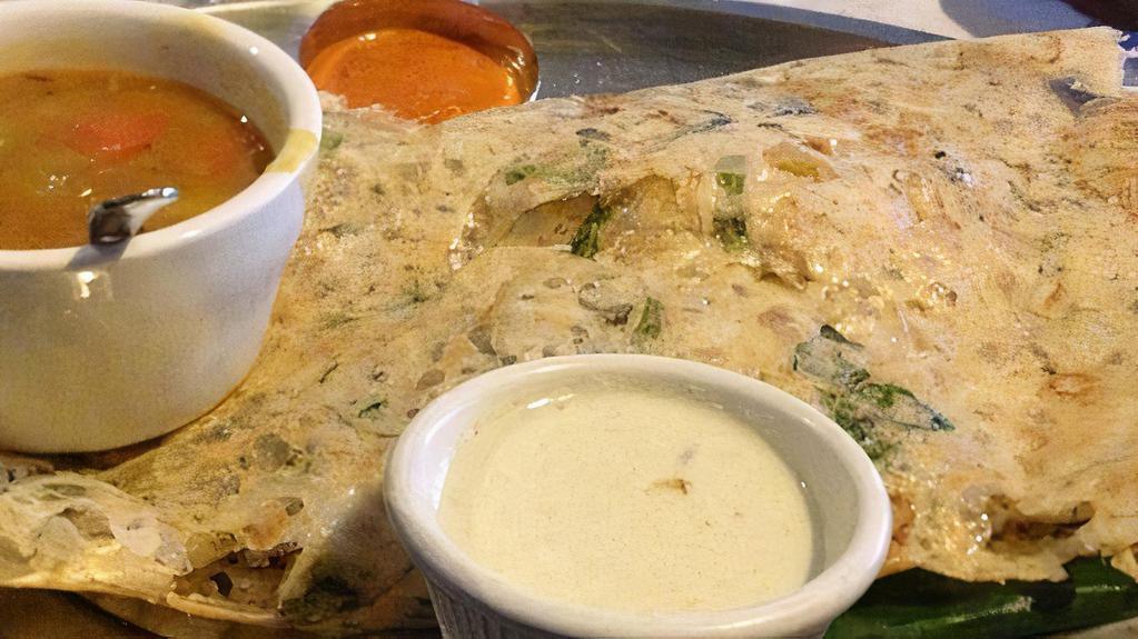 Rava Masala Dosa · Combination of rice and sooji crepe stuffed with southern potato mixture, cooked on Indian griddle, served with sambar and chutney.