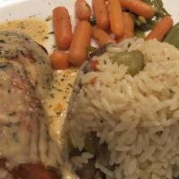 Fresh Bay City Salmon · Salmon fillet stuffed with a rich crab mix and baked. Finished with a lobster cream sauce.