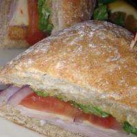 Classic Club Sandwich · Sandwiches served on Ciabatta, Sourdough or Whole Wheat Bread. Turkey, bacon, tomato, lettuc...