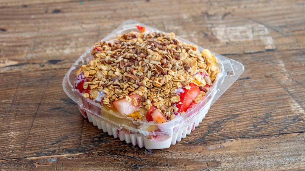 Bionicos · Fresh fruit, topped with cottage cheese, granola, honey.