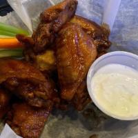 Wings · Choice of mild, hot, BBQ, or Asian sauce.