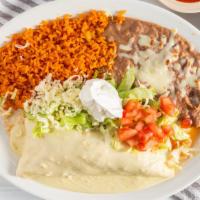 Special Burrito · Flour tortilla stuffed with your choice of meat. Served with rice, beans, lettuce, tomatoes,...