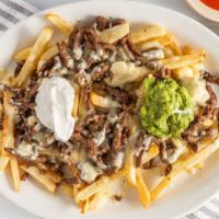 Papas Locas · Fries topped with your choice of meat, melted cheese, sour cream and jalapeños.
