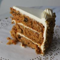 Carrot Cake · Two layers of moist carrot cake with a rich cream cheese butercream icing.