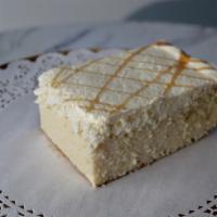 Vanilla Tres Leches · Tres leches in its purest form! Vanilla sponge cake soaked with condensed milk, evaporated m...