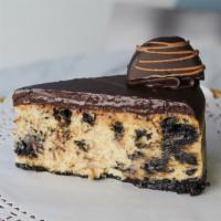 Oreo Cheesecake · A dense cheesecake with Oreo cookies mixed in and then covered in dark chocolate ganache.