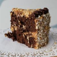 German Chocolate Cake · Two layers of milk chocolate cake with pecans and shredded coconut mixed with caramel icing ...