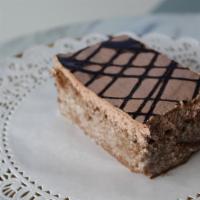 Chocolate Tres Leches · A classic dessert but with a twist! Chocolate sponge cake soaked with condensed milk, evapor...