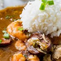 Seafood Gumbo · A traditional Louisiana gumbo with shrimp, crawfish, crab, & andouille sausage.