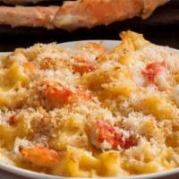 Lobster Mac & Cheese · Nuggets of lobster in a rich & decadent aged cheddar cheese & heavy cream sauce.