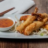 Shrimp Bikini · Marinated shrimp wrapped with spring roll skin, fried and served with our homemade plum sauce