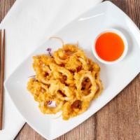 Golden Calamari · Lightly battered slices of calamari, deep-fried and served with our exotic sweet and sour sa...