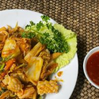 703 Sukiyaki · Medium hot. Modern Thai style sukiyaki…stir-fried seafood combination with cellophane noodle...