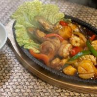 703'S Bar-B-Que Talay · Medium hot. Seafood cooked at very high heat with green peppers, onions, pineapple, and toma...