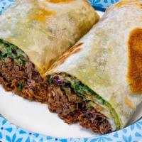 Burritos · Shredded beef burrito includes; cheese, guacamole, cilantro and onion.