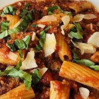 Rigatoni Bolognese · Rigatoni pasta tossed with a mix of veal, pork and beef simmered in a rich tomato sauce, gar...