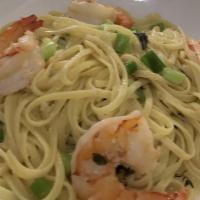 Shrimp Scampi · Five jumbo shrimp served in a white wine garlic butter sauce with scallions over a bed of li...