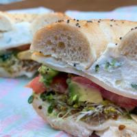 Uncle Gigi · Everything bagel, scooped, skinnied & toasted, chive cream chs, muenster chs, sprouts, cucum...