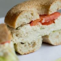 White Fish Salad Sandwich · Available on a bagel, bread, Kaiser Roll, grilled Panini or wheat wrap. Served w/ lettuce, t...