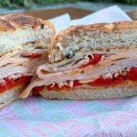 Sophia Loren Sandwich · Served w/ slice pickle: Feel free to sub bagel w/ any bread. Sliced turkey breast, mozzarell...