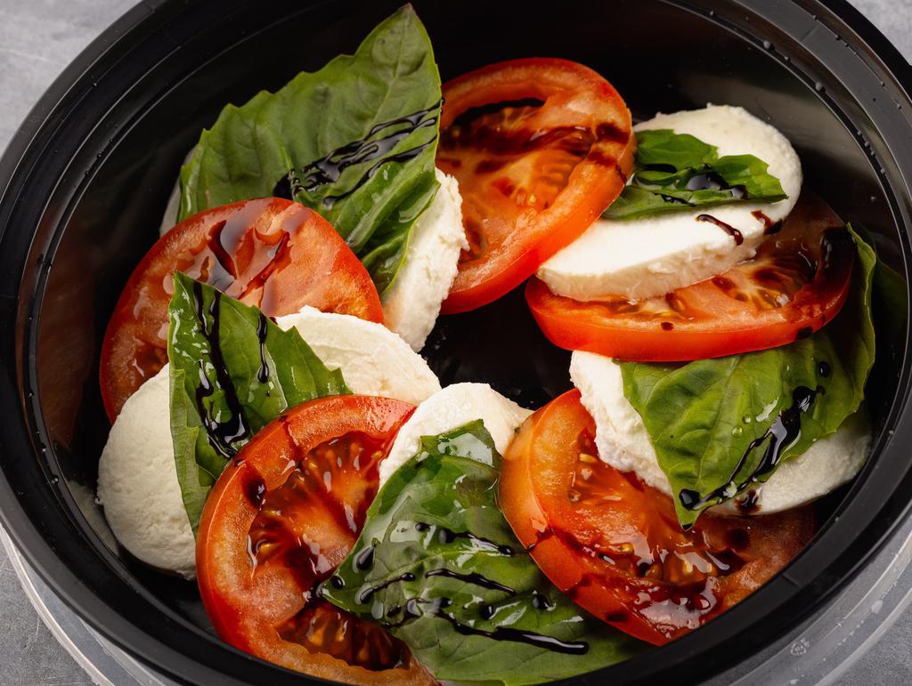 Caprese Salad · Fresh Mozzarella, Heirloom tomato, Basil, Aged Balsamic