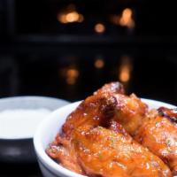 Wings · Hot, mild, or mambo, served with house made blue cheese dressing.