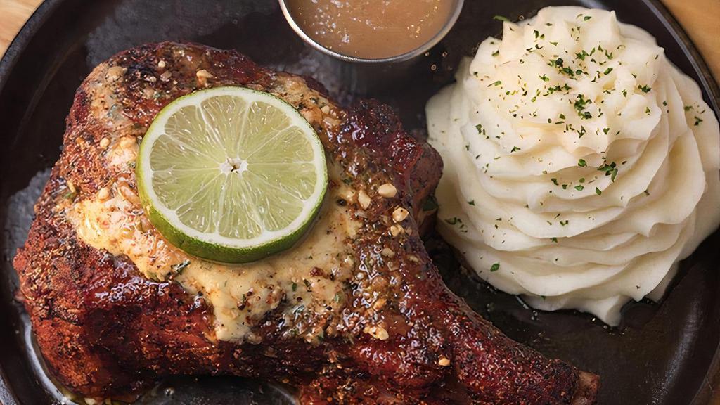 Friday Lunch Pork Chop | Gf · Perry's famous pork chop, slow smoked and caramelized. Served with apple sauce and whipped potatoes