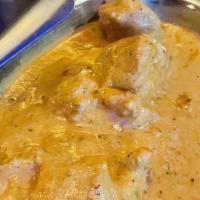 Murgh Shahi Korma · Served with rice. Boneless chicken cooked in a mild cream of saffron and cashew nut sauce