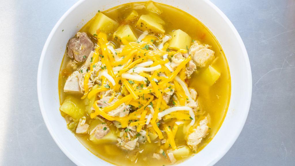 Green Chile Stew · New Mexico style stew with tender chicken, hatch green chile, potatoes, and diced tomatoes, topped with Monterey Jack cheese. A healthy and hearty stew.