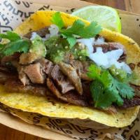 Lengua · Beef tongue with cilantro and onions. Gluten free.