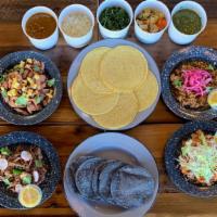 Family Pack · Two pounds of meat(s) of your choice: al pastor, suadero (braised brisket), chicken tinga (p...