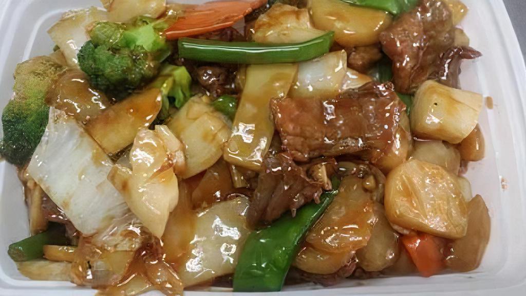 Beef With Scallops · Sliced tender beef & fresh sea scallops sautéed with water chestnuts, snow pea pods, straw mushrooms & Chinese vegetable.