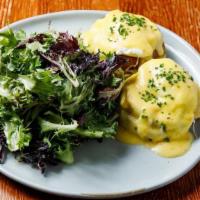 Eggs Benedict  · Two poached eggs, Canadian bacon, English muffin, hollandaise, organic mixed greens
