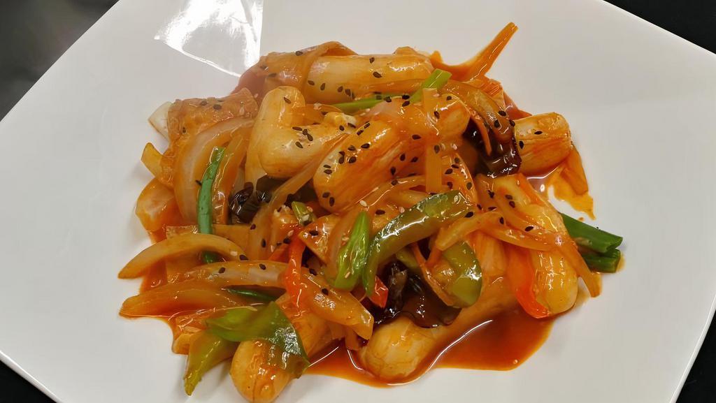 Tteokbokki · Gluten-free, vegetarian, spicy. Stir fried rice cakes and fish cakes in a yummy sweet and spicy sauce. Try it with cheese and/or chicken! For vegetarian, ask for no fish cakes.