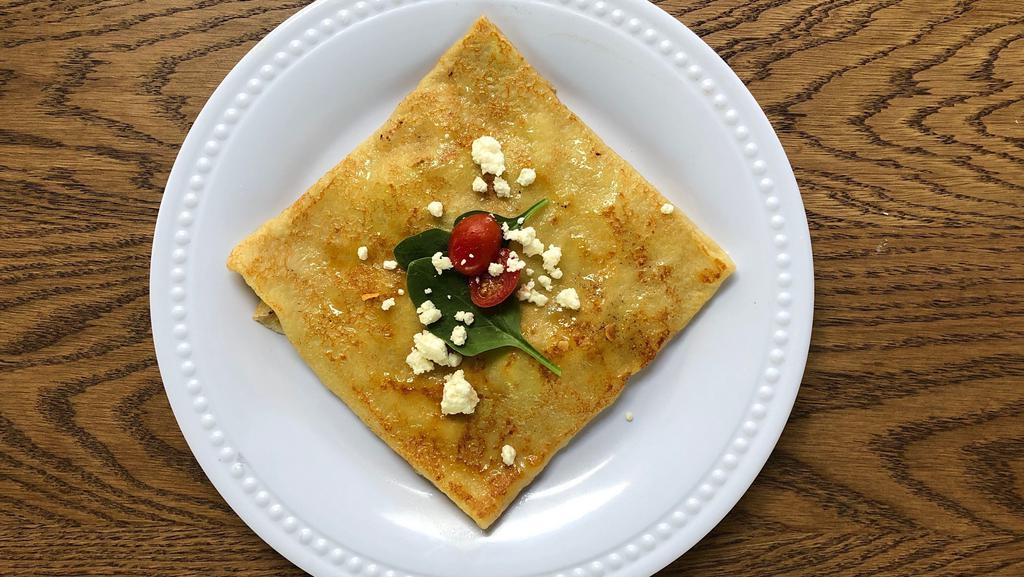 Spinach, Feta And Tomatoes Crepe · This Mediterranean beauty is powerful and delicious. Want some protein? Please choose some for a small fee.