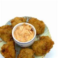 Chicken Bites 6 Pieces · Golden and crunchy and ready to be dipped in one of our many delicious dips. Choose one sauc...