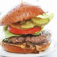 Burger · A juicy 6 oz burger served on a perfect brioche bun with caramelized onions, chipotle remoul...
