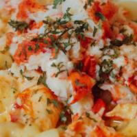 Lobster Mac & Cheese · Creamy Macaroni & Cheese Covered In Maine Lobster.