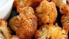 Mild Buffalo Cauliflower Bites · Served with celery or carrots, and blue cheese or ranch.