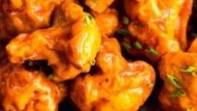 Medium Buffalo Cauliflower Bites · Served with celery or carrots, and blue cheese or ranch.