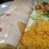 Smothered Chimichanga · Choice of steak or chicken with beans topped with melted white cheese.